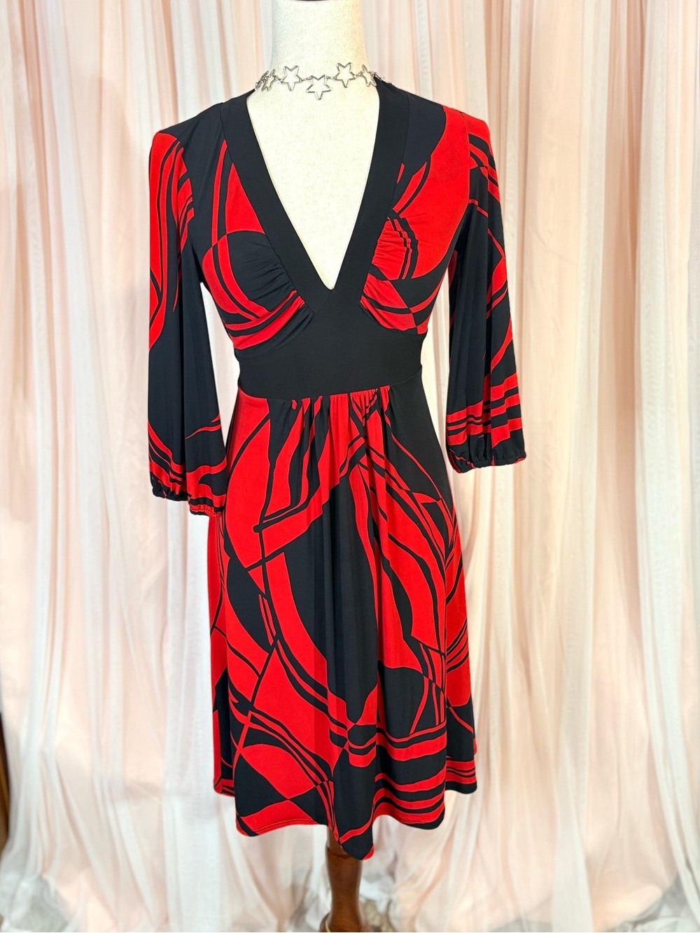 Y2K Bisou Bisou, Bold Red and Black V-Neck, Tie Back Fit and Flare.